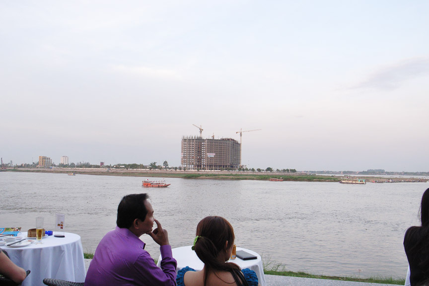 Compared to many of its regional neighbors, Phnom Penh still retains an urban landscape built on human scale. However, as residents and visitors enjoy the breeze while watching fishing boats float by on the banks of the Mekong, Tonle Sap and Bassac rivers, certain "progress"—not necessarily for the betterment of the city—seems inevitable.