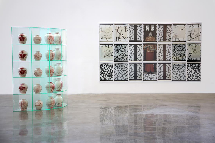 Installation view of MARIA MAGDALENA CAMPOS-PONS’s (left) My Mother Told Me I Am Chinese. China Porcelain, 2008 and (right) My Mother Told Me I Am Chinese. The Painting Lesson, 2008, at “Theorem: You Simply Destroy the Image I Always Had of Myself,” Mana Contemporary, New Jersey, 2015. Courtesy the artist and Mana Contemporary.