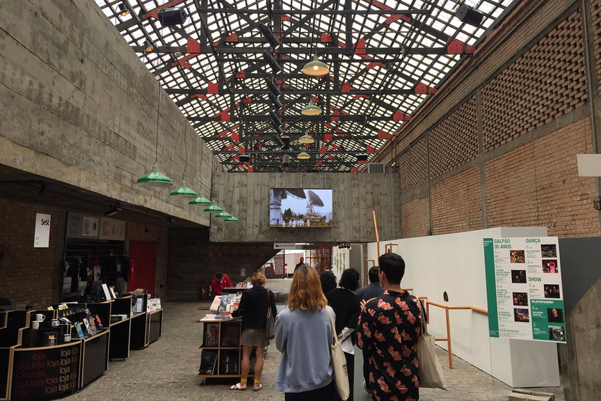 The passage to the Theater Hall at Sesc Pompeia, São Paulo, with a video screen playing La Decanatura’s video Centro Especial Satelital de Colombia (2015). 
All photos by HG Masters for ArtAsiaPacific unless stated otherwise.