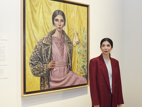 Archibald Prize 2018 recipient YVETTE COPPERSMITH, in front of her winning work, Self-portrait, After George Lambert, 2018, oil and acrylic on linen, 132 × 112 cm. Copyright the artist. Courtesy the Art Gallery of New South Wales, Sydney.