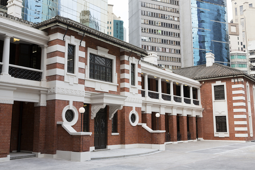 Completed in 1919, THE POLICE HEADQUARTERS BLOCK forms the public face of the complex. While the northern facade is in Neoclassical revival style, the southern side features Classical elements. The building now includes a heritage storytelling space, a police service center, restaurants and shops. Courtesy Tai Kwun, Hong Kong.