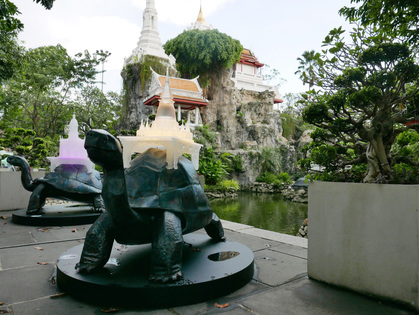 KRIT NGAMSOM’s Turtle Religion (2018) comprises metal tortoise sculptures bearing LED-illuminated replicas of religious institutions in the neighborhood of Klongsan around the Wat Prayoon temple.