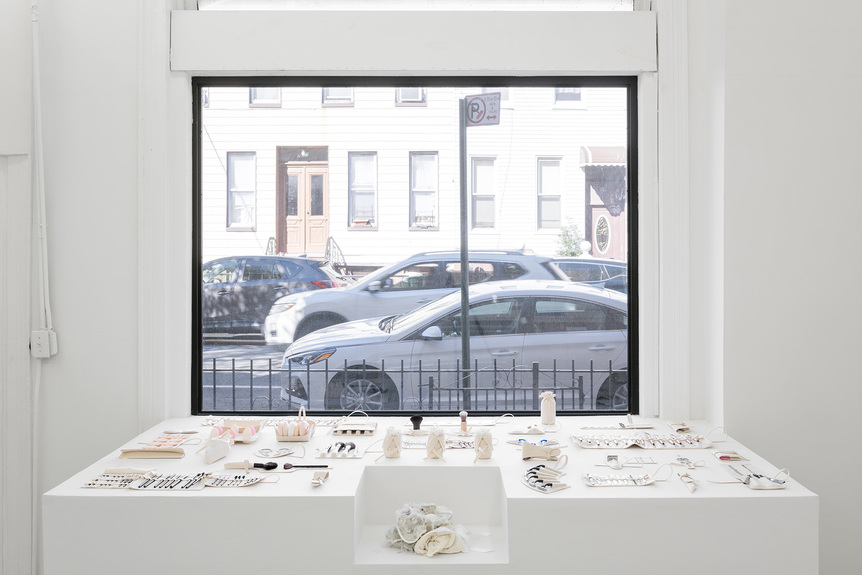 Installation view of BRUNO ZHU’s Joy, b., 2019, cosmetic accessories, ceramic tools, soap, canvas, dimensions variable, at “Guts,” Kimberly-Klark, New York, 2019.