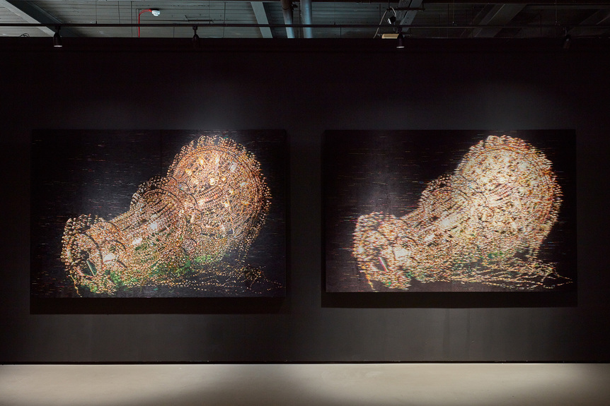 Installation view of KYUNGAH HAM’s (left to right) What you see is the unseen / Chandeliers for Five Cities SR 01-03, 2016–17, and SK 01-05B, 2018–19, both North Korean hand embroidery, silk threads on cotton, middle man, smuggling, bribe, tension, anxiety, censorship, ideology, wooden frame, approx. 1,600 hrs/2 persons, 165 × 247 cm and 160 × 247 cm, at “The Real DMZ Project: Negotiating Borders,” Korean Cultural Centre UK, London, 2019.