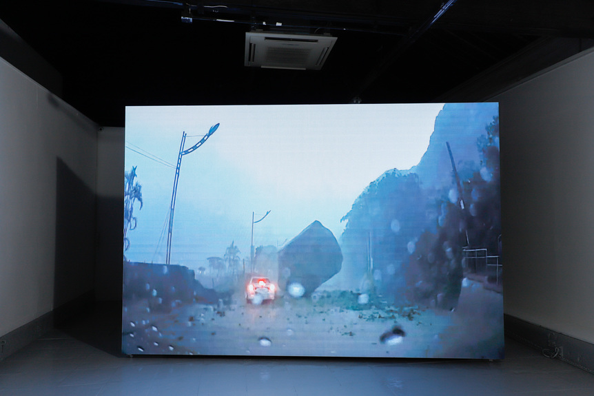 Installation view of LOUIS NIXON’s Falling Rock, 2020, single-channel digital video on LED wall: 1 min 9 sec, at “Beyond Matter,” 1a Space, Hong Kong, 2020.