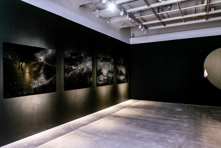 Installation view of TAKAHIRO IWASAKI’s Constellations (Hong Kong), 2018, four spray-painted acrylic panels, 110 × 130 cm each, at “Sight Unseen – Forking Paths in the CHAT Collection,” CHAT, Hong Kong, 2020.