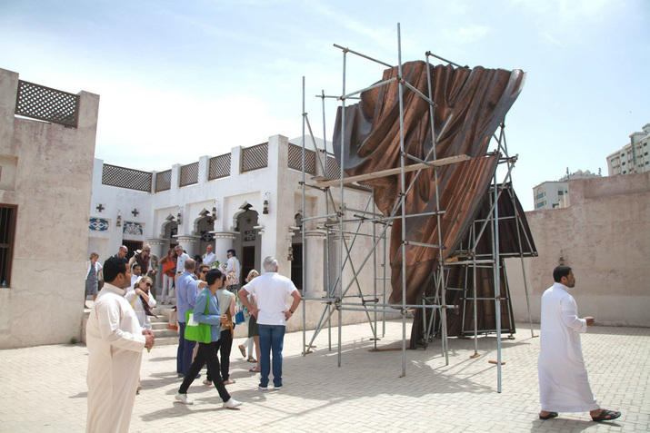 Installation view of DANH VÕ’s Come to where the flavors are, 2015, copper, gold leaf on cardboard, dimensions variable, at Sharjah Biennial 12, 2015. Courtesy Sharjah Art Foundation.