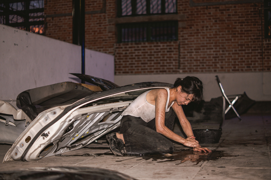 Documentation of FLORENCE LAM’s, Heaven Spot, performance, duration variable, at “Post-human Narratives – The Co-existing Land,” Cattle Depot Artist Village, Hong Kong, 2021. Photo by Siu Ding and Wave Channel.